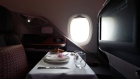 A breakfast table is prepared for a business class seat of a Singapore Airlines Ltd. Airbus SE A380 