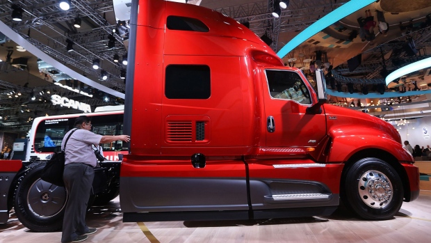 A Traton International LT A26 haulage truck sits on display on the Volkswagen AG (VW) Traton heavy-truck division exhibition area at the IAA Commercial Vehicles Show in Hanover, Germany, on Wednesday, Sept. 19, 2018. Volkswagen AG's truck unit is pushing to reduce its dependence on its main European market and lift profit margins in a challenge to commercial-vehicle industry leaders Daimler AG and Volvo AB.
