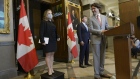 Justin Trudeau, Canada's prime minister, looks towards Chrystia Freeland, Canada's deputy prime minister and minister of finance, left, during a news conference in Ottawa, Ontario, Canada, on Tuesday, Aug. 18, 2020. Freeland, considered a pragmatic minister who handled the renegotiation of the North American free trade agreement with Mexico and the U.S., is the first woman to hold the finance minister role.