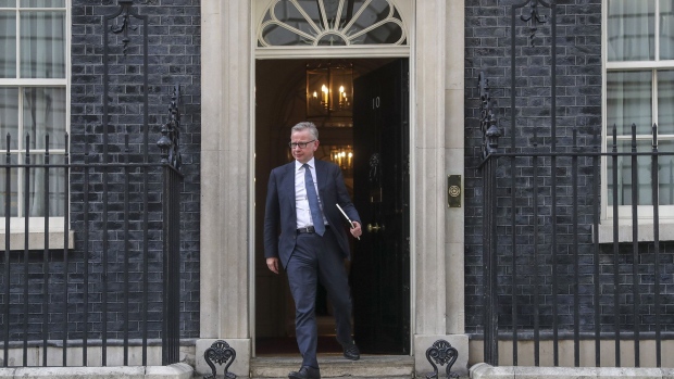 Michael Gove, U.K. Chancellor of the Duchy of Lancaster, departs from number 10 Downing Street in London, U.K., on Wednesday, July 24, 2019. Boris Johnson became prime minister Wednesday afternoon, and is preparing to announce his top ministerial team to deliver the U.K.'s exit from the European Union.