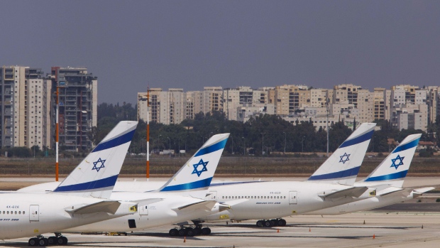 Passenger aircraft operated by El Al Israel Airlines sit on the tarmac at Ben Gurion International airport in Tel Aviv, Israel, on Monday, Sept. 14, 2020. Financially strapped El Al Israel Airlines is planning a 505-million shekel share offer during the coming week, it said in a filing to the Tel Aviv Stock Exchange, the share offering a condition for the flagship carrier to secure a state bailout, including a $250 million loan guarantee. Photographer: Kobi Wolf/Bloomberg