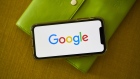 The Google Inc. logo is displayed on an Apple Inc. iPhone in this arranged photograph taken in Little Falls, New Jersey, U.S., on Saturday, July 20, 2019. Alphabet Inc. is scheduled to release earnings figures on July 25. Photographer: Gabby Jones/Bloomberg