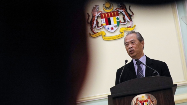 Muhyiddin Yassin, Malaysia's prime minister, speaks during a news conference in Putrajaya, Malaysia, on Monday, March 9, 2020. Malaysia's prime minister picked the head of one the country's main banks as his new finance minister Monday amid heightened global risks and domestic policy uncertainty.