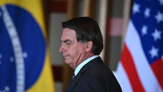 Jair Bolsonaro, Brazil's president, attends a meeting with Robert O'Brien, U.S. national security adviser, not pictured, in Brasilia, Brazil, on Tuesday, Oct. 20, 2020. O'Brien said Brazil and the U.S. share the same values and support free, fair elections in Venezuela.