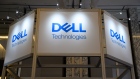The Dell Technologies Inc. logo is displayed at the company's booth during the SoftBank World 2019 event in Tokyo, Japan, on Thursday, July 18, 2019. The founders of Southeast Asian ride-hailing giant Grab, indoor farming startup Plenty, Indian hotel chain OYO Rooms and payments service Paytm took the stage at an annual SoftBank conference to explain how artificial intelligence helps them stay on top in their respective fields. Photographer: Akio Kon/Bloomberg