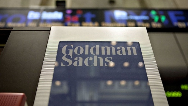 A Goldman Sachs Group Inc. logo hangs on the floor of the New York Stock Exchange in New York, U.S., on Wednesday, May 19, 2010. Goldman Sachs Group Inc. racked up trading profits for itself every day last quarter. Clients who followed the firm's investment advice fared far worse. Photographer: Bloomberg/Bloomberg