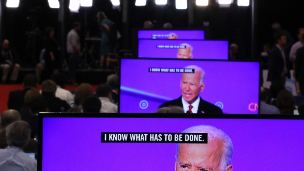 WESTERVILLE, OHIO - OCTOBER 15: Former Vice President Joe Biden appears on television screens in the Media Center during the Democratic Presidential Debate at Otterbein University on October 15, 2019 in Westerville, Ohio. A record 12 presidential hopefuls are participating in the debate hosted by CNN and The New York Times. (Photo by Chip Somodevilla/Getty Images)