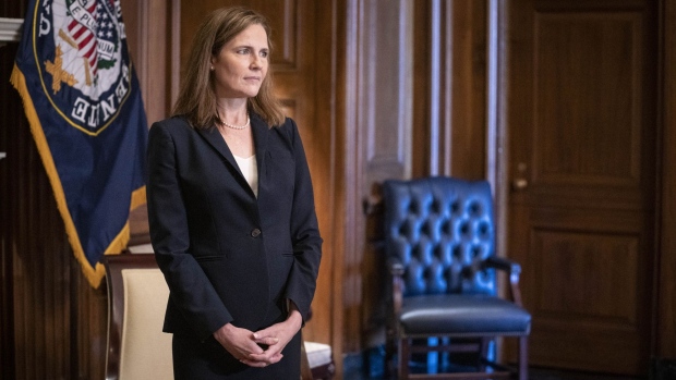 Amy Coney Barrett, U.S. President Donald Trump's nominee for associate justice of the U.S. Supreme Court, meets with Senator James Lankford, a Republican from Oklahoma, not pictured, at the U.S. Capitol in Washington, D.C., U.S., on Wednesday, Oct. 21, 2020. Barrett said she didn't have detailed advance knowledge of what Democrats say became a coronavirus "super-spreader" event when Trump announced her Supreme Court nomination at a crowded White House ceremony last month.