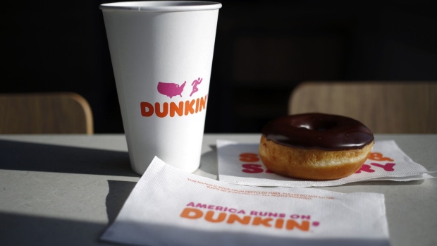 A half-dozen box of donuts sits on the counter inside a Dunkin' location in Mount Washington, Kentucky, U.S., on Thursday, Jan. 30, 2020. Dunkin' Brands Group Inc. is scheduled to release earnings figures on Feb. 6. 