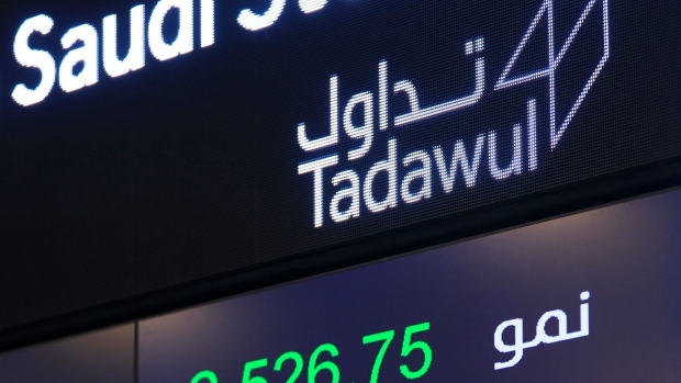 Stock price movements sit on a digital display board at the Saudi Stock Exchange, also known as Tadawul, in Riyadh, Saudi Arabia, on Sunday, Nov. 4, 2018.