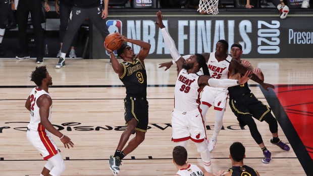 Rajon Rondo #9 of the Los Angeles Lakers shoots the ball over Jae Crowder #99 of the Miami Heat during the fourth quarter in Game Five of the 2020 NBA Finals at AdventHealth Arena at the ESPN Wide World Of Sports Complex on October 9, 2020 in Lake Buena Vista, Florida. 