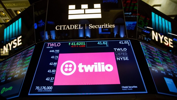 A monitor displays Twilio Inc. signage on the floor of the New York Stock Exchange (NYSE) in New York, U.S., on Friday, April 27, 2018. U.S. stocks were mixed as euphoria from better-than-forecast earnings reports faded with investors contemplating the implications of higher interest rates in an economy that may be cooling. Photographer: Michael Nagle/Bloomberg