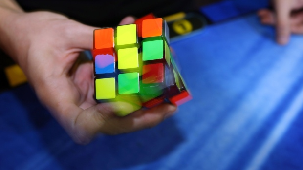 A competitor tries to solve the Rubik cube on the final day of the 2010 Rubik's Cube German Championships in the 3x3x3 cube 'Classical category' in the western German city of Bottrop on September 12, 2010.