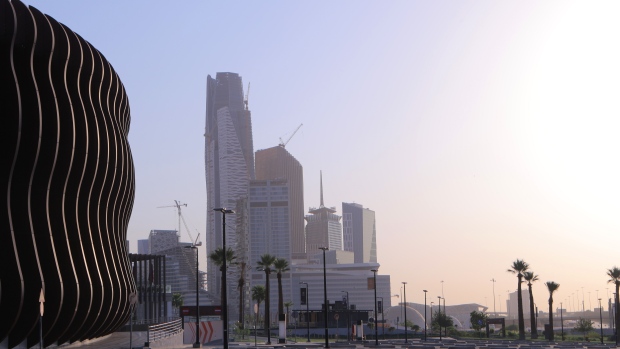 Skyscrapers stand in the King Abdullah Financial District (KAFD) beyond an empty parking lot in Riyadh, Saudi Arabia, on Tuesday, July 28, 2020. Saudi Arabia suffered a simultaneous decline in oil and non-oil revenue as the global pandemic combined with lower energy prices to jolt the kingdom’s public finances. Photographer: Maya Anwar/Bloomberg