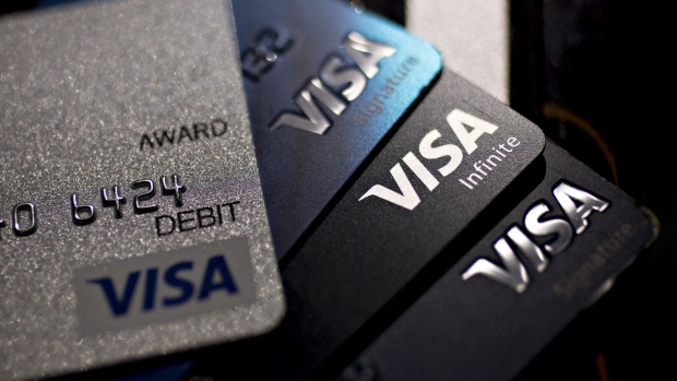 Visa Inc. credit and debit cards are arranged for a photograph in Washington, D.C., U.S., on Monday, April 22, 2019. Visa Inc. is scheduled to release earnings figures on April 24.