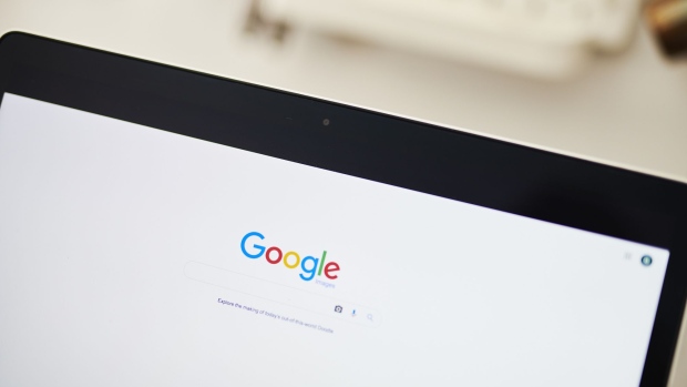 The Google Inc. homepage is displayed on an Apple Inc. laptop computer in this arranged photograph taken in the Brooklyn borough of New York, U.S., on Friday, July 19, 2019. Alphabet Inc. is scheduled to release earnings figures on July 25. Photographer: Gabby Jones/Bloomberg