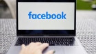 The logo for Facebook is displayed on a laptop computer in an arranged photograph taken in Little Falls, New Jersey, U.S., on Wednesday, Oct. 7, 2020.