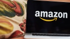The logo for Amazon.com Inc. is displayed on an Apple Inc. laptop computer in an arranged photograph taken in the Brooklyn borough of New York, U.S., on Friday, April 10, 2020.