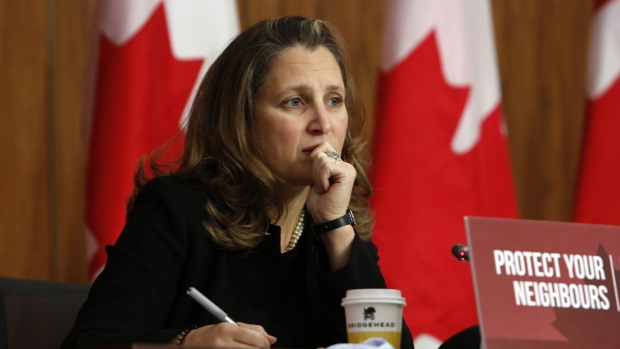 Chrystia Freeland, Canada's deputy prime minister and minister of finance, listens during a news conference in Ottawa, Ontario, Canada, on Tuesday, Oct. 20, 2020. Prime Minister Justin Trudeau warned opposition lawmakers they will trigger an election in Canada if they approve the creation of an "anti-corruption" committee.