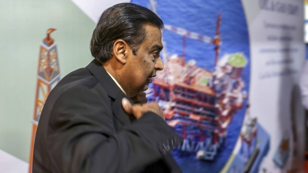 Mukesh Ambani, chairman and managing director of the Reliance Industries Ltd., arrives for the company's annual general meeting in Mumbai, India, on Monday, Aug. 12, 2019. Saudi Aramco will buy a 20% stake in the oil-to-chemicals business of India’s Reliance Industries Ltd., including the 1.24 million barrels-a-day Jamnagar refining complex on the country’s west coast, Ambani said at the company’s annual general meeting in Mumbai.