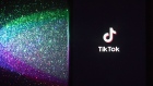 The logo for ByteDance Ltd.'s TikTok app is arranged for a photograph on a smartphone in Sydney, New South Wales, Australia, on Monday, Sept. 14, 2020. Oracle Corp. is the winning bidder for a deal with TikTok’s U.S. operations, people familiar with the talks said, after main rival Microsoft Corp. announced its offer for the video app was rejected. Photographer: Brent Lewin/Bloomberg