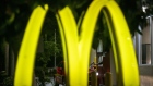 Signage is displayed at a McDonald's Corp. restaurant in Lynwood, California, U.S., on Monday, April 27, 2020. McDonald's is cutting capital expenditures and suspending buybacks as the coronavirus pandemic gnawed at sales. Photographer: Kyle Grillot/Bloomberg