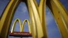 Signage stands outside a McDonald's Corp. fast food restaurant in Bowling Green, Kentucky, U.S.