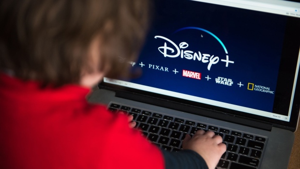 The Disney+ logo is displayed on a laptop computer in Hastings-on-Hudson, New York, U.S., on Friday, Feb. 7, 2020. Walt Disney Co.'s new streaming service gets its first big test of subscriber loyalty next month, when a free trial with Verizon Communications Inc. starts to expire. Photographer: Tiffany Hagler-Geard/Bloomberg