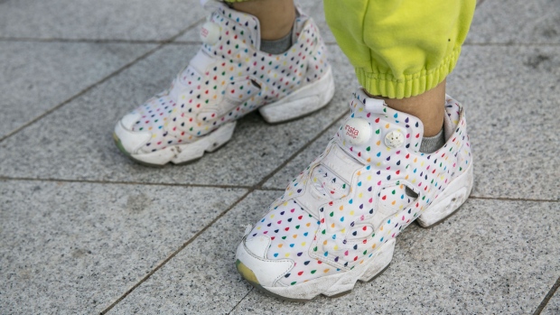 SEOUL, SOUTH KOREA - OCTOBER 18: A guest wearing Reebok sneakers is seen during the Seoul Fashion Week 2020 S/S at Dongdaemun Design Plaza on October 18, 2019 in Seoul, South Korea. (Photo by Jean Chung/Getty Images)