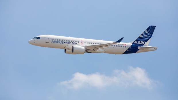 A new Airbus A220 single-aisle aircraft comes in to land in Toulouse, France, on Tuesday, July 10, 2018. Airbus renamed the C Series jet acquired from Bombardier Inc. the A220 and set a target of at least 100 orders for the aircraft this year.