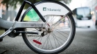 Manulife Financial Corp. signage is displayed on a bicycle in Montreal, Quebec, Canada, on Monday, Aug. 20, 2018.
