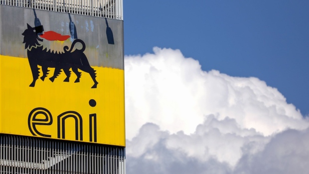 The ENI SpA logo sits on the company's headquarters office building in Rome, Italy, on Friday, April 24, 2020. Eni SpA reported a 94% drop in first-quarter profit and cut its production forecast for the year as demand is crushed by the coronavirus pandemic. Photographer: Alessia Pierdomenico/Bloomberg