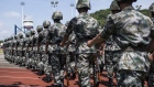 Members of the People's Liberation Army march during a demonstration at an open day at the Ngong Suen Chau Barracks in Hong Kong in 2015.