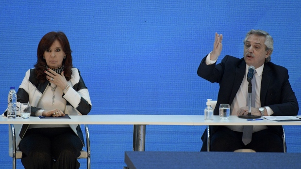 BUENOS AIRES, ARGENTINA - AUGUST 31: President of Argentina Alberto Fernandez and Vice President of Argentina Cristina Fernandez de Kirchner gesture during a press conference to give details about the agreement with major private creditors to restructure roughly $65 billion in sovereign debt at Museo del Bicentenario on August 31, 2020 in Buenos Aires, Argentina. (Photo by Juan Mabromata - Pool/Getty Images)