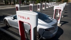 A Tesla Inc. vehicle charging at a Tesla Supercharger station in Petaluma, California, U.S., on Thursday, Sept. 24, 2020. 