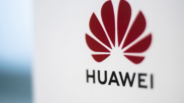 A Huawei logo sits on display inside a Huawei Technologies Co. store at Menlyn Park Shopping Center in Pretoria, South Africa, on Wednesday, Aug. 12, 2020. Telecom company Rain said it has set up South Africa's first commercial fifth-generation mobile network in two large cities using equipment from China's Huawei. Photographer: Waldo Swiegers/Bloomberg