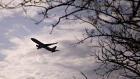 A plane departs Reagan National Airport in Arlington, Virginia on April 6, 2020