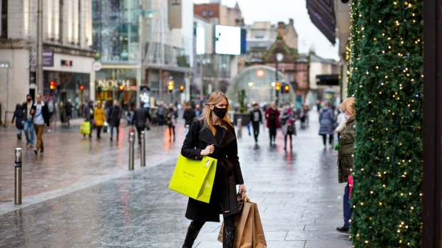 Shoppers on the high street in Glasgow, U.K., on Friday, Nov. 20, 2020. Support in Scotland for breaking away from the rest of the U.K. climbed to a record as the coronavirus pandemic and economic fallout harden political divisions in the country. Photographer: Emily Macinnes/Bloomberg