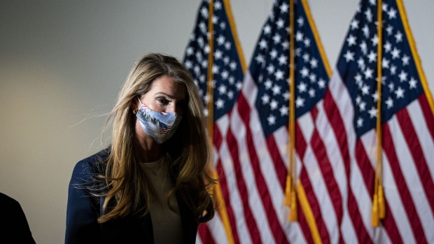 Senator Kelly Loeffler, a Republican from Georgia, wears a protective mask while arriving for the weekly Senate Republican policy luncheon on Capitol Hill in Washington, D.C., U.S., on Tuesday, Nov. 17, 2020. President-elect Biden yesterday threw his weight behind House Democrats' proposals for a coronavirus relief bill, calling for aid to state and local governments, among other measures.