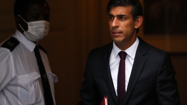 Rishi Sunak, U.K. chancellor of the exchequer, departs number 11 Downing Street on his way to present his 'Winter Economy Plan' at Parliament in London, U.K., on Thursday, Sept. 24, 2020. Sunak will set out a new crisis plan to protect jobs and rescue businesses as the coronavirus outbreak forces the U.K. to return to emergency measures. Photographer: Simon Dawson/Bloomberg