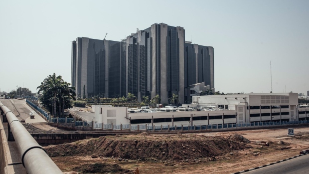The headquarters of the Nigerian central bank stands in Abuja, Nigeria, on Friday, Jan. 10, 2020. Revenue in Nigeria has fallen short of the government target by at least 45% every year since 2015, and shortfalls have been funded through increased borrowing. Photographer: KC Nwakalor/Bloomberg