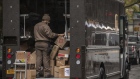 A United Parcel Service Inc. driver sorts boxes in New York.