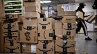 Amazon.com Inc. boxes sit at a United States Postal Service (USPS) facility in Fairfax, Virginia, U.S., on Tuesday, May 19, 2020. The Postal Service in recent weeks has sought bids from consulting firms to reassess what the agency charges companies such as Amazon, UPS and FedEx to deliver products on their behalf between a post office and a customer's home, the Washington Post reported last week. Photographer: Andrew Harrer/Bloomberg