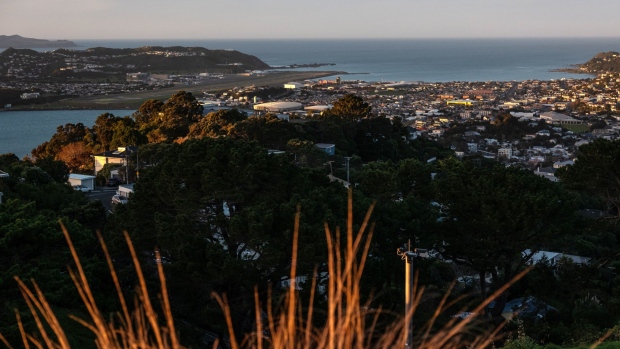 Residential and commercial buildings standing on the city skyline are seen from Mount Victoria Lookout at dawn in Wellington, New Zealand, on Saturday, June 22, 2019. The out-of-favor kiwi dollar has tumbled about 3% this quarter as the Reserve Bank of New Zealand turned dovish and cut interest rates, the first central bank in the developed world to do so. Economic growth held at a five-year low in the three-months through March, leaving the door open for further easing. Photographer: Birgit Krippner/Bloomberg