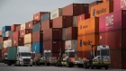 Trucks wait to be loaded with shipping containers in the West Basin Container Terminal at the Port of Los Angeles in San Pedro, California, U.S., on Friday, Nov. 20, 2020. October was another record month for dockworkers at the West Coast port of Long Beach as more than 800,000 cargo containers were processed, a first in the terminals 109-year history. Photographer: Bing Guan/Bloomberg