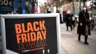 A 'Black Friday' sales sign outside a store offering discounts all week in Berlin, Germany, on Thursday, Nov. 26, 2020. With Black Friday almost underway, equity traders are bracing for a holiday season where brick-and-mortar businesses that lack strong digital platforms could suffer. Photographer: Stefanie Loos /Bloomberg