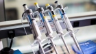 Pipettes are seen at the Moderna Therapeutics Inc. lab in Cambridge, Massachusetts, U.S., on Tuesday, Nov. 14, 2017. Moderna this week started testing a personalized treatment that teaches the body how to fight cancer. Photographer: Bloomberg/Bloomberg