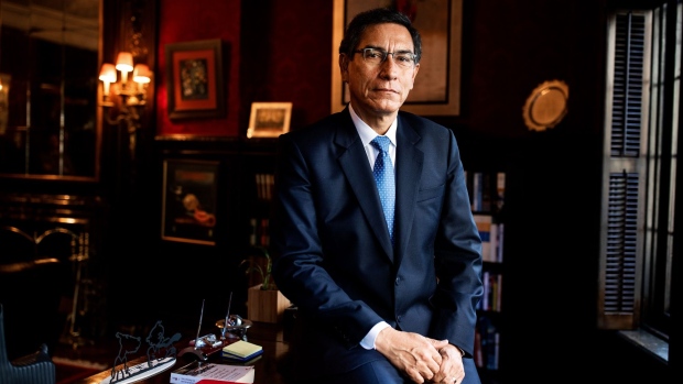 Martin Vizcarra, Peru's president, sits for a photograph following an interview in New York, U.S., on Wednesday, Sept. 25, 2019. During the UN General Assembly meeting, Vizcarra said that growing social, economic inequality, and high corruption levels, constitute a latent risk for democracy and good governance.