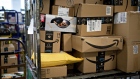 Amazon.com Inc. boxes sit at a United States Postal Service (USPS) facility in Fairfax, Virginia, U.S., on Tuesday, May 19, 2020. 