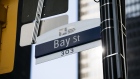 A Bay Street sign stands on display in the financial district of Toronto, Ontario, Canada, on Thursday, July 25, 2019. Canadian stocks fell as tech heavyweight Shopify Inc. weighed on the benchmark and investors continued to flee pot companies. 